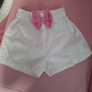 Charming White Kids Shorts with Pink Bow